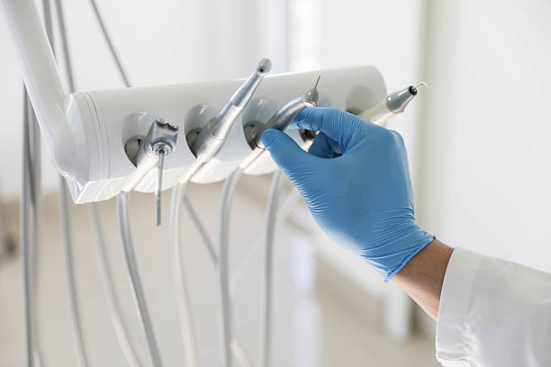 Professional Tooth Extraction technician working in Wilmington, IL